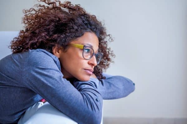 stressed sad woman coach home e1640171072378