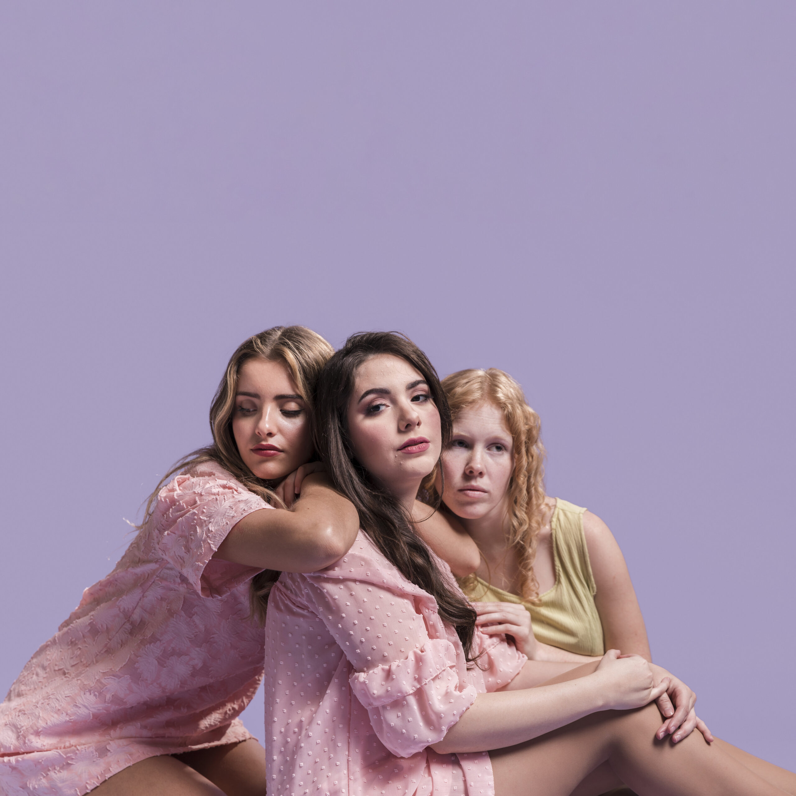 group women hugging each other as sign sisterhood scaled