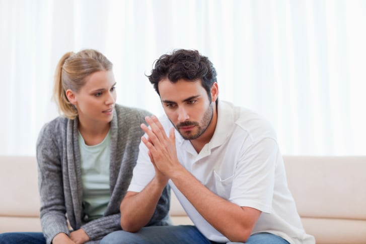 couple angry on couch